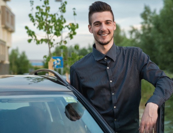 Man stood next to car