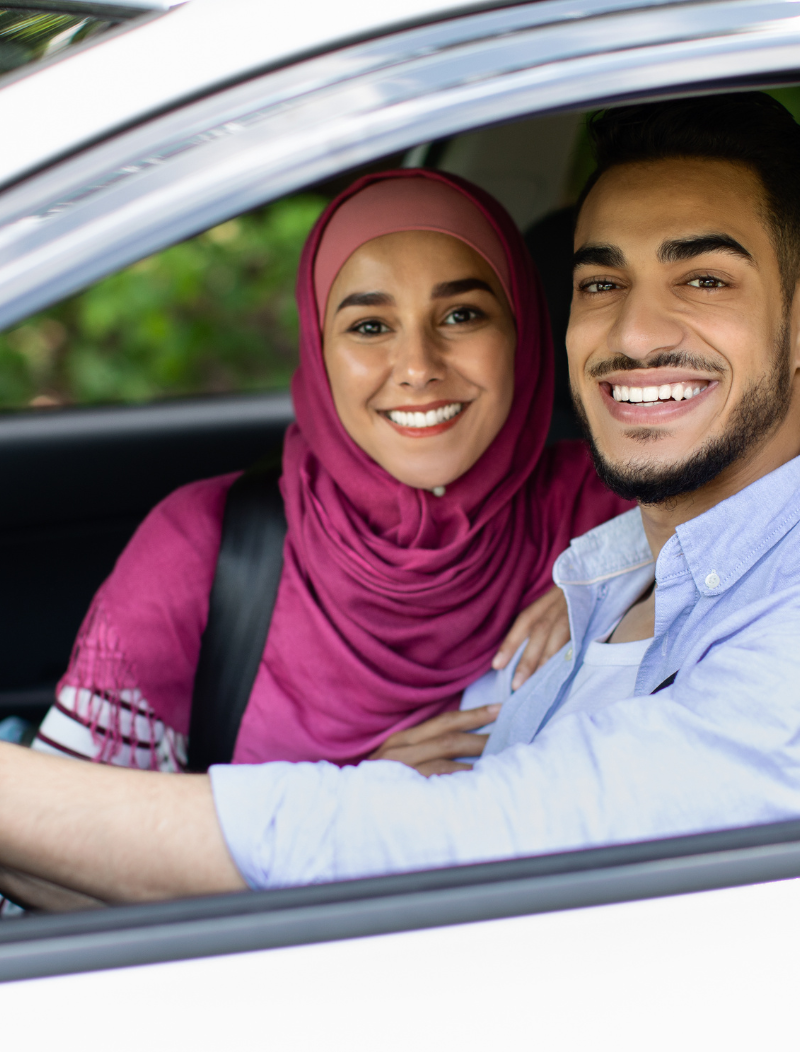 Muslim family in car with ban behind the wheel